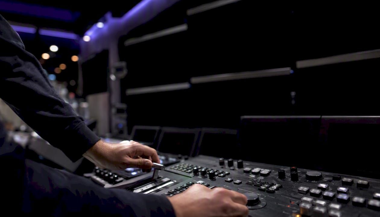 1786739552825_Hands-tuning-AI-monitoring-hardware-controls.jpeg