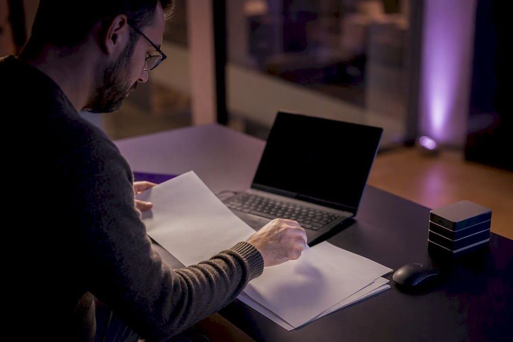 Hands organizing materials for software document