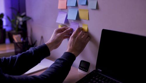 1786374374977_Hands-arranging-sticky-notes-for-software-estimation.jpeg